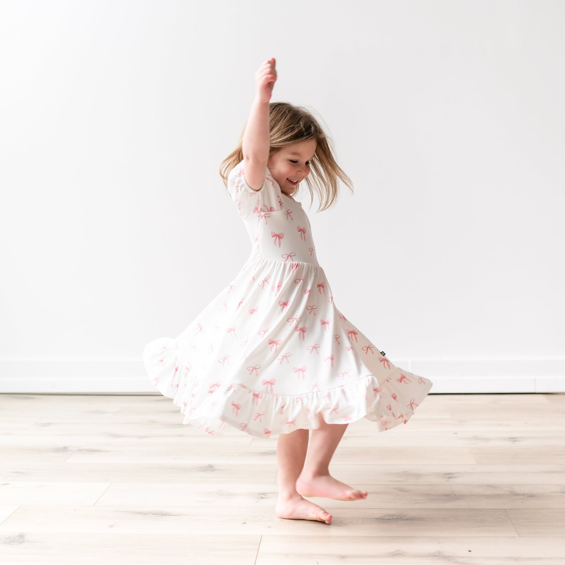 Puff Sleeve Twirl Dress in Bow